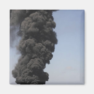 Dark clouds of smoke and fire emerge magnet