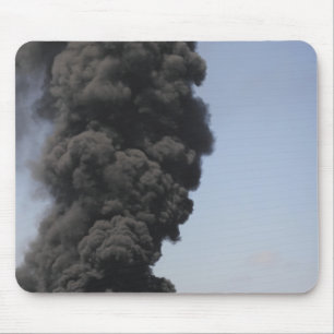 Dark clouds of smoke and fire emerge mouse mat