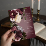 Dark Elegant Burgundy & Cream Blur Floral Wedding Invitation<br><div class="desc">Step into a realm of exquisite elegance with our floral dark and moody wedding invitation. Designed to captivate the senses, this invitation boasts a striking burgundy background adorned with a breathtaking burst of rich burgundy and cream roses, pale lavender grey hydrangeas, and other mixed florals in soft white and palest...</div>