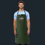 Dark Green Tan Monogram Personalised Apron<br><div class="desc">This personalised apron features a tan monogram initial and white retro script name on a dark green background. It makes a great Father's Day gift for the man who loves to grill or cook!</div>