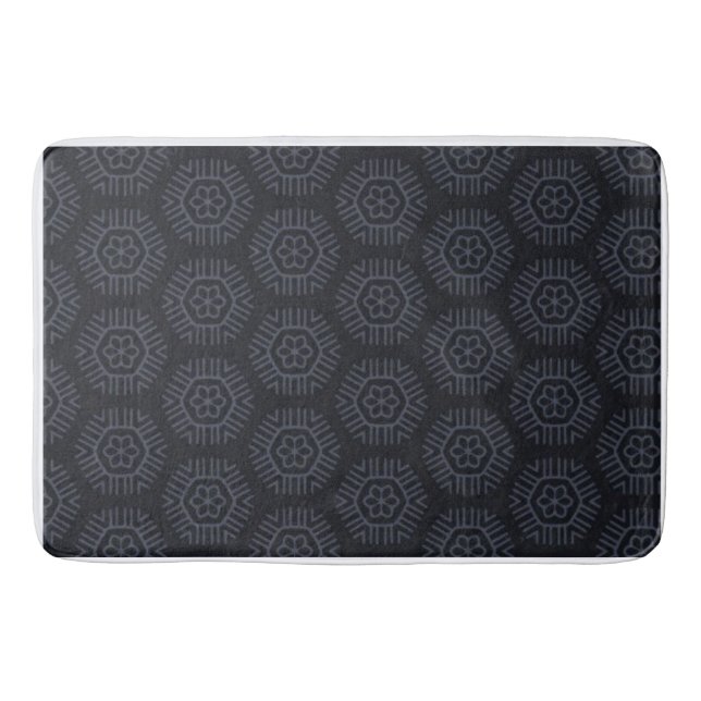 Dark grey hexagonal slightly darker grey backgrond bath mat (Front)