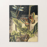 Dark Nature Scene by Vision Studio Jigsaw Puzzle<br><div class="desc">This dark nature scene shows a couple of butterflies and a dragonfly congregating above deep green leaves and a beautiful flower. You can almost hear the beating of wings as you study the piece. If you enjoy nature you'll enjoy this painting. Buy your copy today!</div>