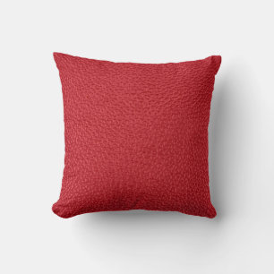 Dark red artificial leatherette closeup. cushion