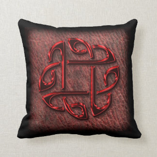 Dark red celtic knot on leather cushion