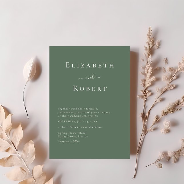 Dark Sage Green Minimalist Script Wedding Invitation (Dark Sage Green Minimalist Script Wedding Invitation on a table with blush pink flowers.)