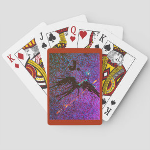 Dark winged figure flying across the space playing cards