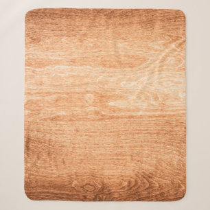 Dark wood texture background surface with old natu sherpa blanket