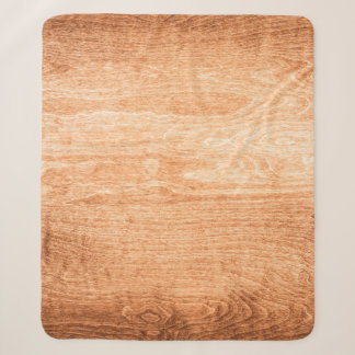 Dark wood texture background surface with old natu sherpa blanket