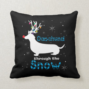Daschund Gift Through The Snow Christmas Pun Cushion
