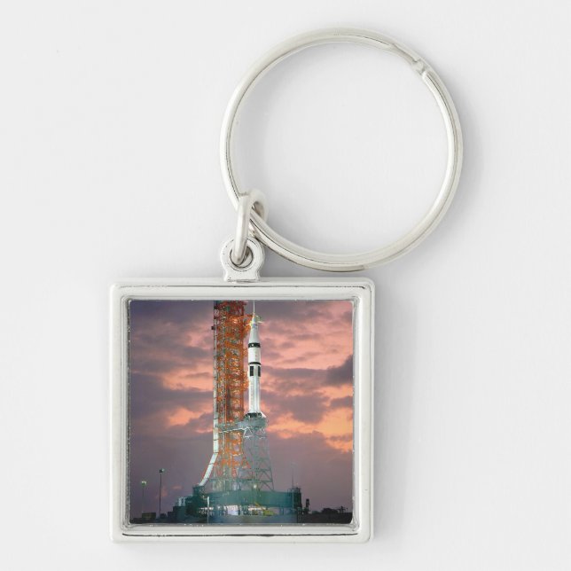 Dawn breaks behind ASTP Saturn IB CDDT Key Ring (Front)