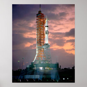 Dawn breaks behind ASTP Saturn IB CDDT Poster