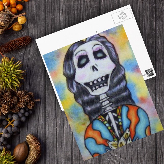 Day of the Dead Postcard (Day of Dead happy lady skeleton orange blue cape flowers on postcard.)
