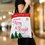Days Be Merry Bright Trees Gold Star Custom Name Tote Bag<br><div class="desc">“May your days be merry & bright.” A playful illustration of a red script typography quote and green trees, against gold glitter stars and a red band, helps you usher in Christmas and New Year. Feel the warmth and joy of the holiday season whenever you use this cute and fun...</div>