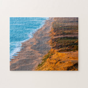 Days Last Light Strikes The Sandy Shore Of Point Jigsaw Puzzle