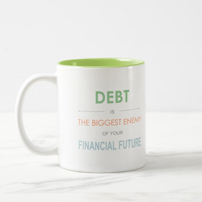 Debt is the biggest enemy Dave Ramsey coffee mug (Left)