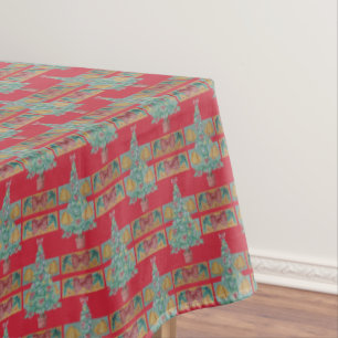 decorations bells and red bows on tree christmas tablecloth
