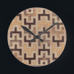 Decorative African Mudcloth Pattern Round Clock<br><div class="desc">Decorative African mudcloth pattern by Norman Wyatt Jr. featuring geometric shapes that seem to fit together. Fans of Tetris or geometric shapes should make this purchase today!</div>