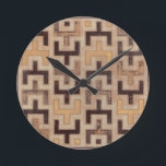 Decorative African Mudcloth Pattern Round Clock<br><div class="desc">Decorative African mudcloth pattern by Norman Wyatt Jr. featuring geometric shapes that seem to fit together. Fans of Tetris or geometric shapes should make this purchase today!</div>