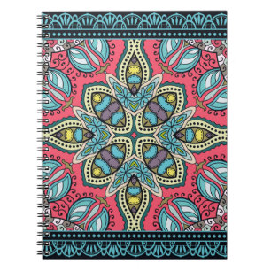 Decorative colourful ornament on a black backgroun notebook