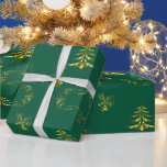 Decorative Gold and Green Christmas Wrapping Paper<br><div class="desc">This green and gold Christmas wrap features elegant, decorative golden elements on a festive green background. You'll find golden holly and gold berries, very modern looking gold Christmas trees, golden stars and decorative swirls. Our 'Decorative Gold and Green Christmas' wrapping paper will be sure to add a touch of style...</div>