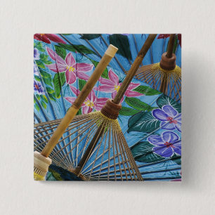 Decorative hand painted umbrellas in the village 15 cm square badge