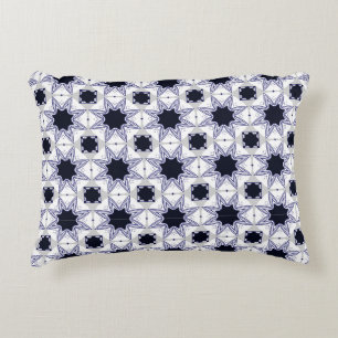 decorative pillow featuring a geometric pattern