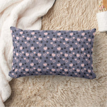 Decorative pillow with a modern minimalist design.