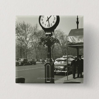 Decorative street clock two background people 15 cm square badge