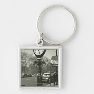 Decorative street clock two background people key ring
