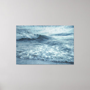 Deep blue northern beach with crashing waves canvas print