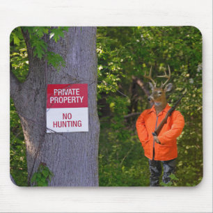 Deer hunter with rifle in woods mouse mat
