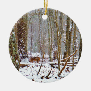 Deer in the snow, licking leg ceramic tree decoration