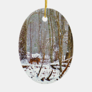 Deer in the snow, licking leg ceramic tree decoration