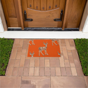 Deer on red doormat