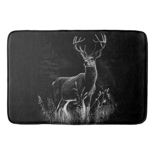 Deer with antlers framed by field and tree     bath mat