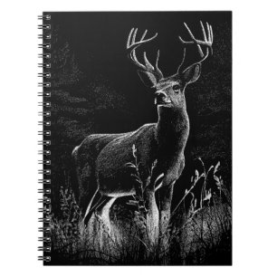 Deer with antlers framed by field and tree notebook