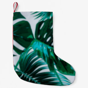 Defocus abstract background of the green plantabst small christmas stocking