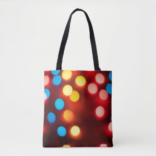 Defocused christmas lights. New Year bokeh. Abstra Tote Bag