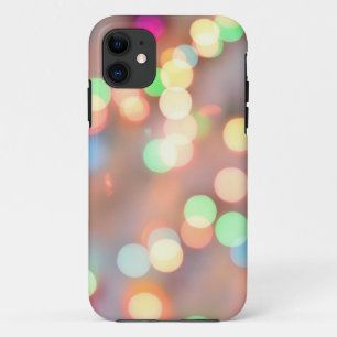 Defocused image of illuminated christmas Light iPhone 11 Case