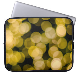 Defocused night light background. Abstract circula Laptop Sleeve