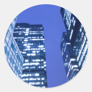 Defocused upward view of office building windows classic round sticker