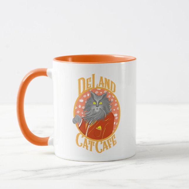 DeLand Cat Cafe's Henry DeCat in orange suit Logo Mug (Left)