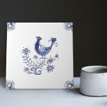 Delft Blue Dutch Style Bird Flowers Indigo Ceramic Tile<br><div class="desc">This handcrafted ceramic tile features a stunning design inspired by the traditional Delft Blue Dutch style. The intricate details of the bird and flowers are meticulously painted in blue and white, showcasing the beauty and elegance of this classic style. For centuries, Delft Blue Ceramic Tiles have been a beloved decorative...</div>