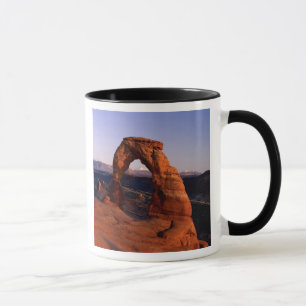 Delicate Arch at Sunset with snow covered La Mug