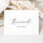 Delicate Black Calligraphy Reserved Sign<br><div class="desc">This delicate black calligraphy reserved sign is perfect for a modern wedding. The card is double sided (prints on both sides). The romantic minimalist design features lovely and elegant black typography on a white background with a clean and simple look. Use these cards to reserve chairs or tables at your...</div>