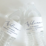 Delicate Blue Calligraphy Wedding Welcome Water Bottle Label<br><div class="desc">These delicate blue calligraphy wedding welcome water bottle labels are perfect for a modern wedding. The romantic minimalist design features lovely and elegant midnight blue typography on a white background with a clean and simple look. Personalise these labels with your names, and wedding date. These labels are perfect for destination...</div>