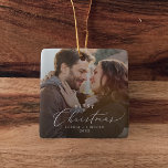 Delicate First Christmas Couple Dark Overlay Photo Ceramic Ornament<br><div class="desc">This delicate first Christmas couple dark overlay photo ceramic ornament is the perfect modern Christmas tree decoration. The romantic minimalist design features lovely and elegant black typography with a clean and simple look. Personalise your double-sided keepsake ornament with a photo,  your names and the year.</div>