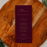 Delicate Gold and Burgundy Wedding Dinner Menu<br><div class="desc">This delicate gold and burgundy wedding dinner menu card is perfect for a modern wedding. The romantic minimalist design features lovely and elegant champagne golden yellow typography on a burgundy red background with a clean and simple look. This menu can be used for a wedding reception, rehearsal dinner, or any...</div>