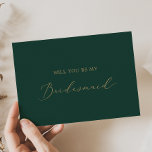 Delicate Gold and Green Bridesmaid Proposal Card<br><div class="desc">This delicate gold and green bridesmaid proposal card is perfect for a modern wedding. The romantic minimalist design features lovely and elegant champagne golden yellow typography on an emerald green background with a clean and simple look. Customise the card with the name of the bride and the bridesmaid. Personalise the...</div>