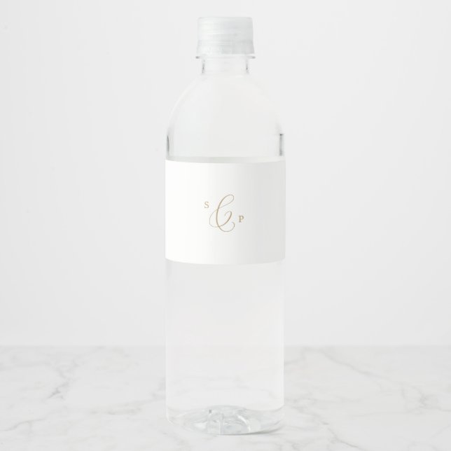 Delicate Gold Calligraphy Monogram Wedding Water Bottle Label (Front)
